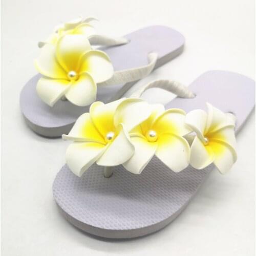 Slippers female summer flip-flops with flat non-slip seaside on necessary joker flower beach shoes