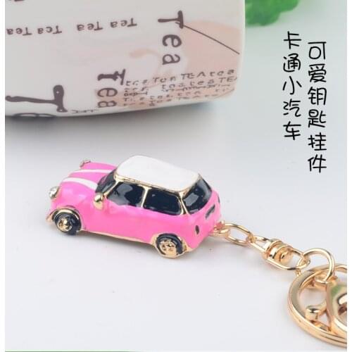 Creative gift gift gift inlaid with Rhinestone sports car lovely car key chain womens bag pendant Pendant Chain Ring Jewelry