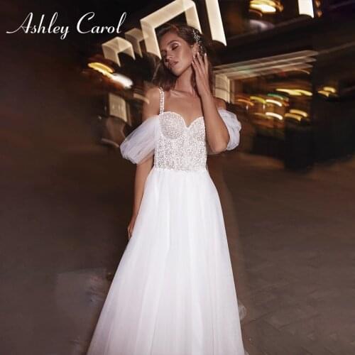 Ashley Carol A-Line Wedding Dress 2021 Sweetheart Straps Backless Bride Spaghetti Straps Beach Shiny Tulle Bridal Gowns