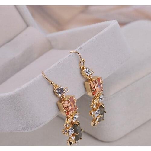 Fashion earrings with diamonds and natural stones