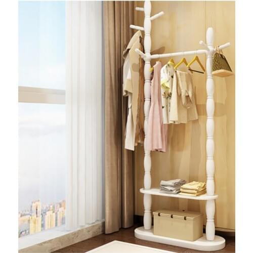 Coatrack ground solid wood home to hang clothes. The bedroom shelf