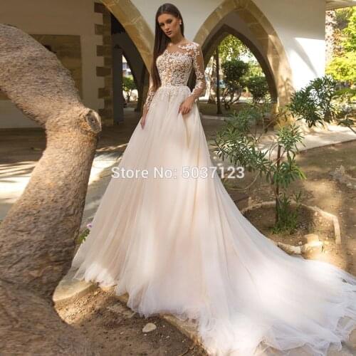 Sheer O Neck Long Sleeves Wedding Dresses 2021 Tulle Lace Appliques A Line Buttons Bridal Gowns Vestido De Noiva Court Train