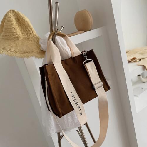 Creative new canvas bag female casual large-capacity shoulder messenger bag letter simple Korean version of the art cloth bag