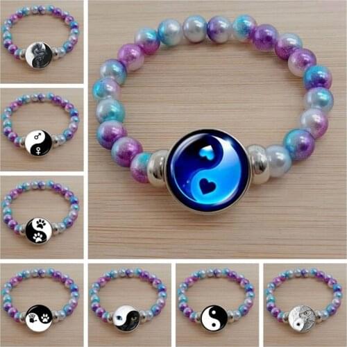 Simple ancient yin and yang symbol keychain eight-picture tai chi art pattern glass cabochon colorful beads bracelet jewelry
