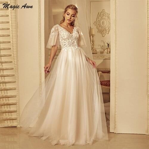 Magic Awn Graceful Wedding Dresses Boho 2021 Lace Appliques V-Neck Open Back Bridal Gowns Half Sleeves Princess Robes Mariage