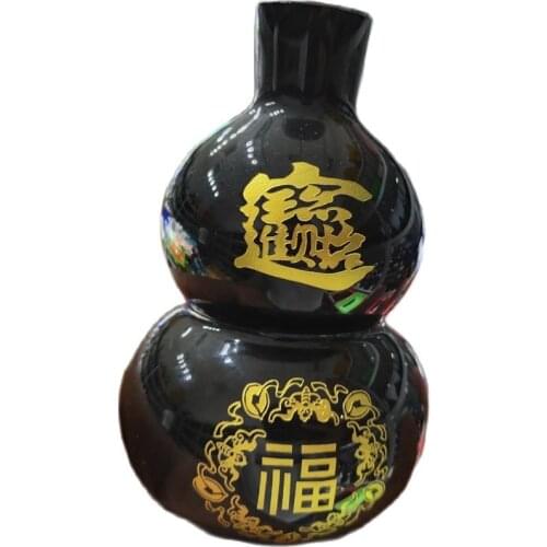 Rare natural obsidian carved gourd shape statue