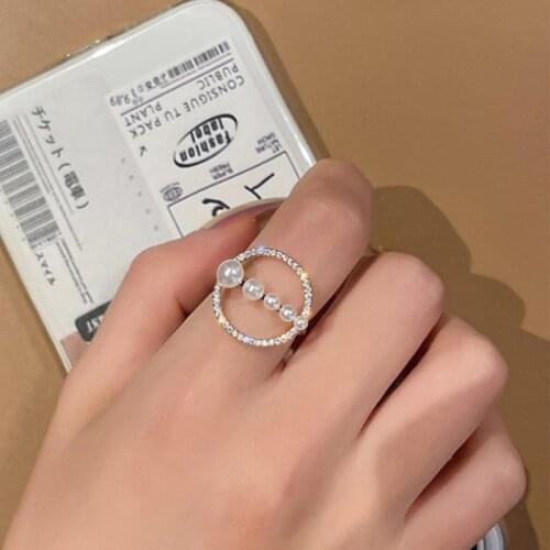 U-Magical Exquisite Circle Imitation Pearl Rhinestone Ring for Women Geometric Hollow Open Adjustable Index Finger Ring Jewelry