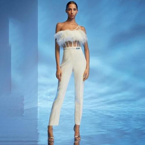 High quality elegant white bandage jumpsuit high quality rayon sexy one shoulder woman jumpsuits long pants feathers