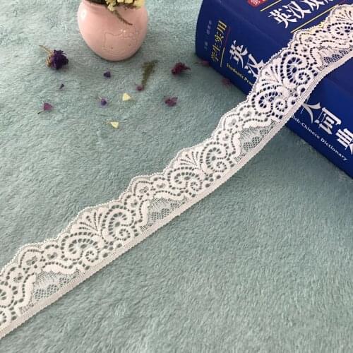 Model C2374, a wavy lace, embellished your collar