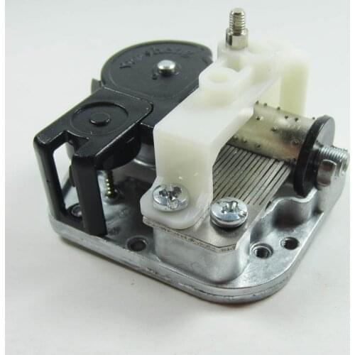 DIY music box mechanism with rotating shaft