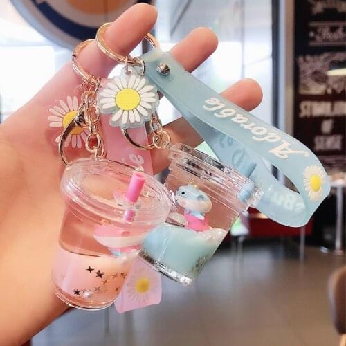 Creative Milk Tea Cup Keychains Calf Doll Liquid Floating Keychain Cute Backpack Pendant Key Ring Ornament