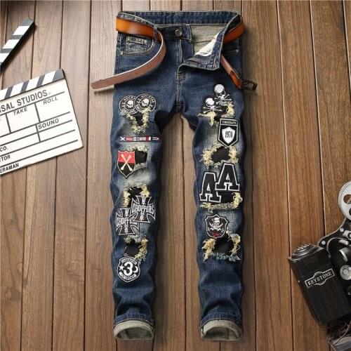 Mens Retro Blue Jeans Pencil Pants Patch Skulls Pattern Patchwork Embroidery Long Trousers Holes J70