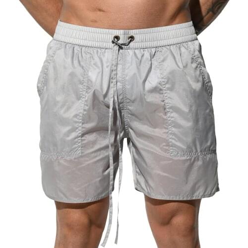 Men Swimming Shorts Loose Beach Shorts Solid Swimwear Quick Dry Swim Trunks Summer Swimsuit Translucent Sports Short Pants Surf