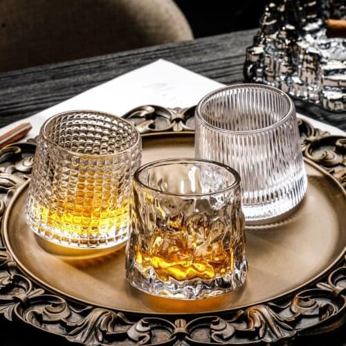 Whiskey glass glass wine glass crystal glass creative tumbler cup shaped cup rotating wine glasses