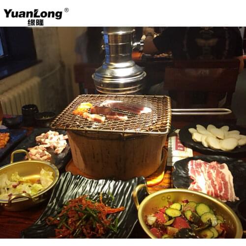 Old fashion clay cooking oven circular carbon baking meat pottery charcoal fire original clay stove BBQ grill net