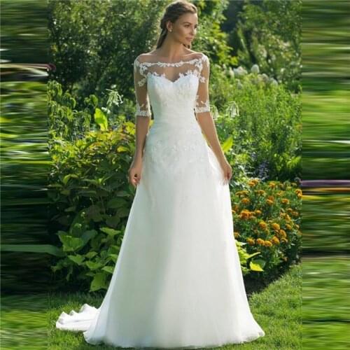 Half Sleeves A-Line Wedding Dress Lace Appliques Vintage Ladies Tulle Buttons Adorned Bridal Gowns Spring Vestidos De Mariee