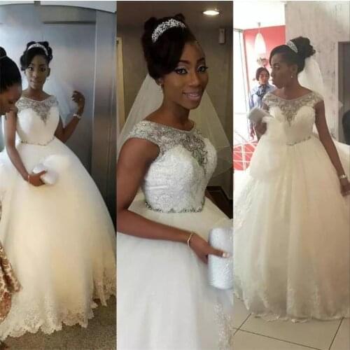 Ball Gown Wedding Dresses Dazzling Crystal Beading Appliques Capped Sleeves Nigeria Women Long Sheer Neck Bridal Dress Gown