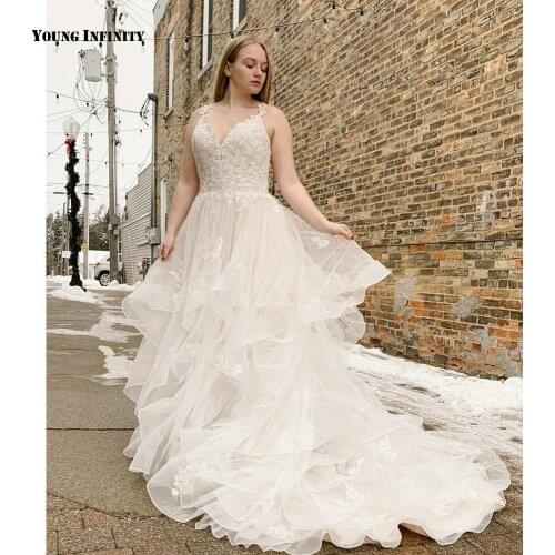 Amazing Ball Gown Wedding Dresses 2021 Sleeveless Bridal Gown Backless Sweetheart Chapel Train Applique White Plus Size Bride