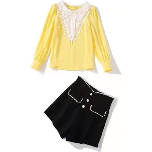 European and American womens wear for spring 2021 long-sleeved yellow lace shirt Black shorts Fashion suits