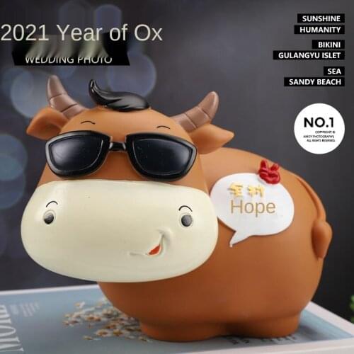 Creative personality Niuniu piggy bank 2021 year of the ox doll piggy bank fashion fall proof childrens gifts for men and women