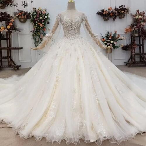 Ivory Feathers Beading Luxury O-Neck Wedding Dresses 2021 Long Sleeve Dubai High-end Bridal Gowns HX0179 Custom Made