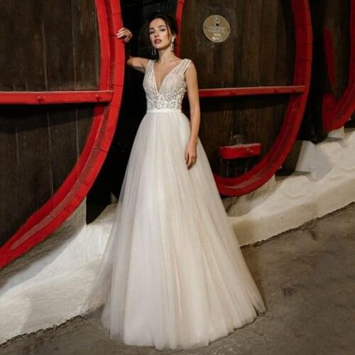 Vestido elegante Wedding Dress Gelinlik Princess Bridal Dresses Sleeveless Robe de Mariee Shiny V Neck Wedding Gowns