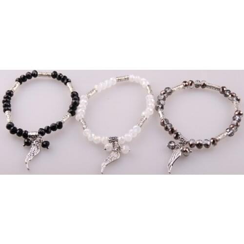 Free shipping 6mm crystal glass beads with Alloy swing charm Stretched Bracelets for women holiday gift