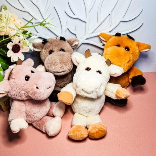 Soft cute Cute Creative cute sitting cow doll Couple pendant keychain 15cm high quality bag Baby bed pendant kids birthday gift