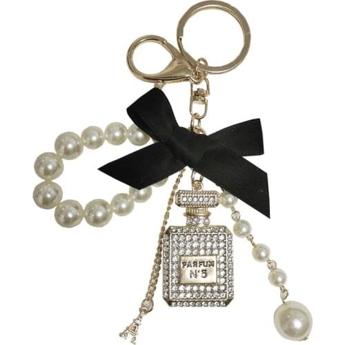 Pearl Chain Bottle Keychain For Woman Luxury Jewelry Bow Car Keyring Bowknot Camellia Pearl Pendant Keychains Bag Decoration