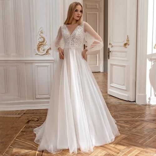 Elegant Long Sleeve V-Neck Wedding Dresses 2021 Lace Appliques Tulle Button Back A-Line Bridal Gown Floor Length Sweep Train