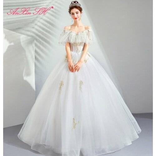 AXJFU Princess vintage golden flower lace wedding dress Korea vintage beading flower illusion o neck wedding dress 1606