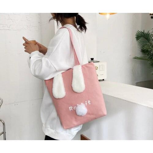 Lovely canvas handbag for girls Cartoon toy rabbit ear bag Large capacity shoulders bag