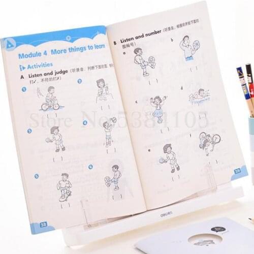 Students Use 70530 Desktop Bookshelves To Put Books On The Shelves. The Students Read Books On The Shelves. The Children Rea