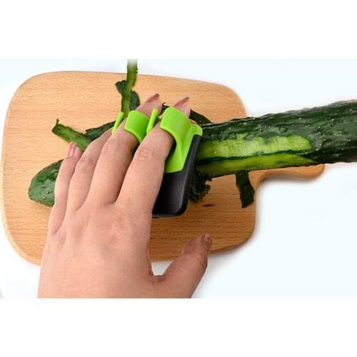 2021 Creative Finger Held Palm Peeler Easy Hold Stainless Steel Household Multi-function Planer Fruit Knife Kitchen Accessories