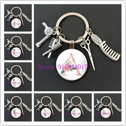 New simple white background flower 26 letter pattern glass keychain mini hairdressing scissors hair dryer comb pendant keychain