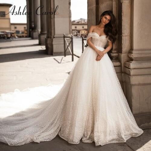 Ashley Carol A-Line Wedding Dress 2021 Charming Sweetheart Pearls Point Wave Bride Backless Cap Sleeve Princess Bridal Gowns