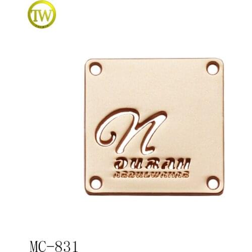 Custom hollow out misty gold metal label zinc alloy metal tags for garment