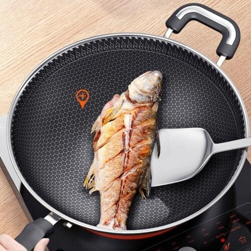 Multi-functional uncoated household wok induction cooker universal 5th generation 304stainless steel honeycomb wok non-stick pan