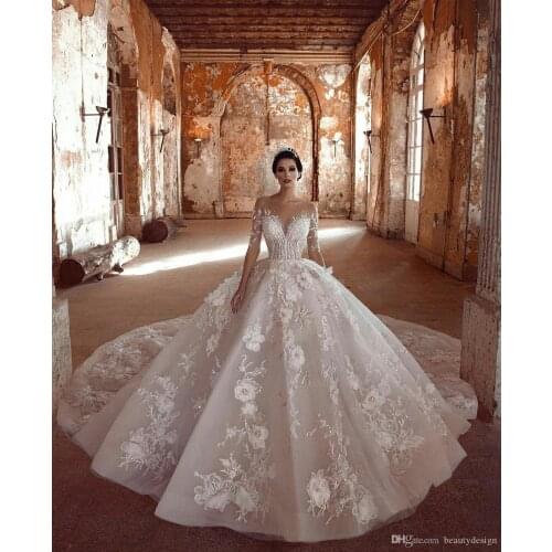 Luxury Arabic Wedding Dresses 2020 Ball Gown Sheer Neck Floral Appliqued Beaded Garden Long Sleeves Bridal Gowns