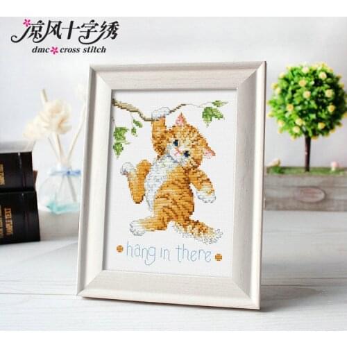 A cat hanging on a tree cross stitch kit DMC brand thread animal dog count canvas fabric embroidery handmade needlework