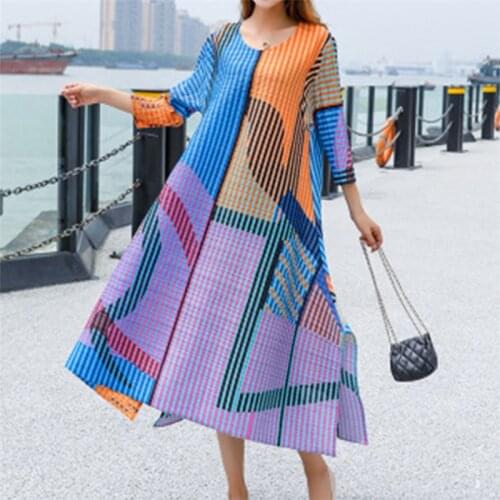 Miyake pleated dress, temperament, large size dress, 2021 spring, covering belly, thin, super fairy, elegant beach pleated dress