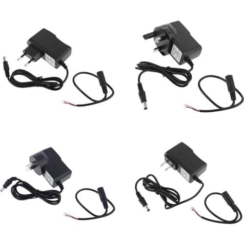 Universal EU/US/AU/UK Plug 5.5x2.1mm AC Converter Adapter DC 3V 1.5A Power Supply Replace 2x D AA AAA Battery Eliminator