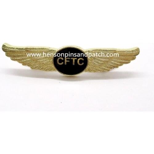 Custom 3D gold metal hard enamel wing badge for OFTC