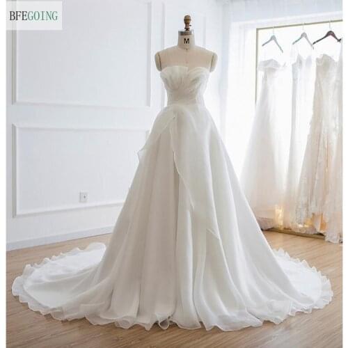 Ivory Organza A-line Wedding Dresses Floor-Length Sleeveless Chapel Train Strapless Lace up Bridal Gown
