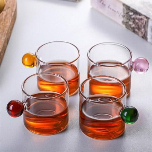 Glass Tea Cup Tumbler Eddy Bottom Swirl Designer Wine Cup For Bar Whisky Tea Coffee Shot Glass Colorful Round Handle Creative