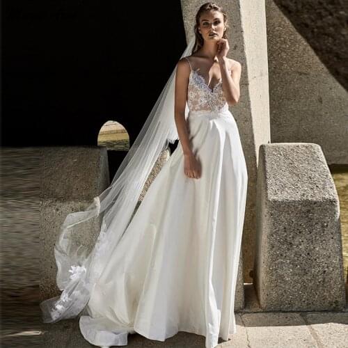 Magic Awn 2021 Beach Wedding Dresses Lace Appliques Pearl Beaded Satin Bride Dress For Women A-Line Boho Backless Abito Da Sposa