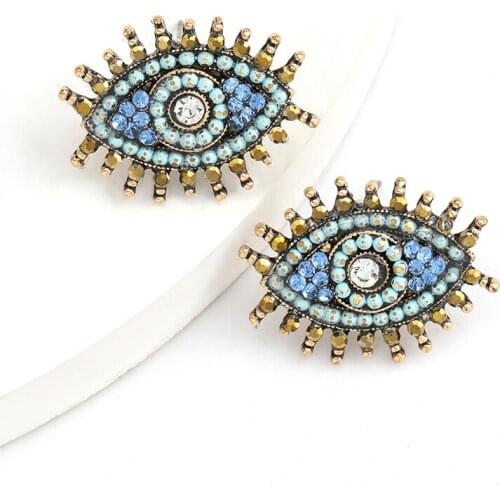 Personality Ins Wind Metal Spray Paint Inlaid Rhinestone Eye Earrings Women European And American Retro Niche Ear Stud