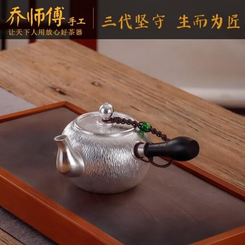 Manual silver pot of sterling silver 999 side put the pot of tea home rush their insulation tea teapot pot of wood