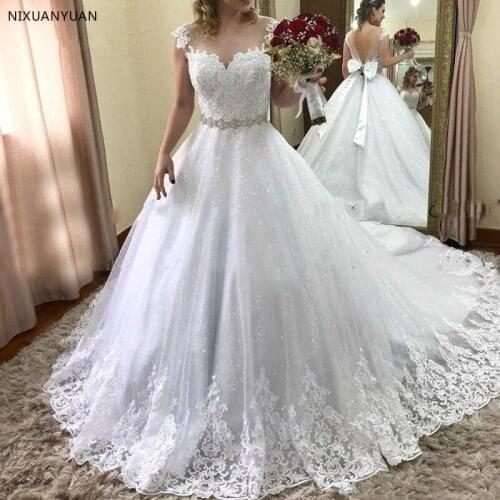 Unique Tulle Jewel Neckline A-line Wedding Dress with Beaded Lace Appliques Rhinestones Sash Open Back with Bowknot Bridal Gown