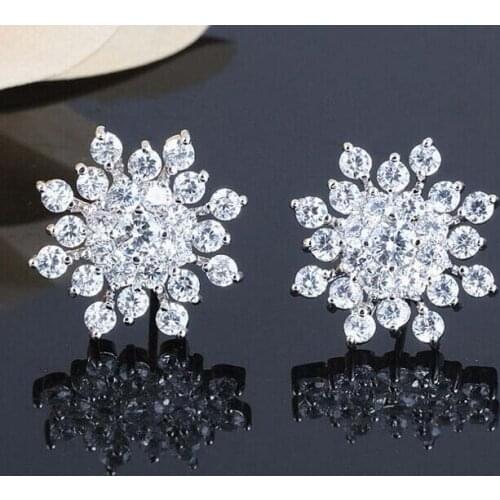 Women preferred white plum-shaped earrings zircon